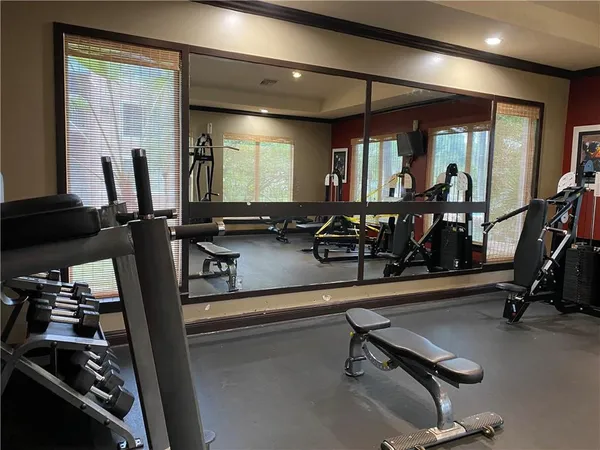 a view of a room with gym equipment