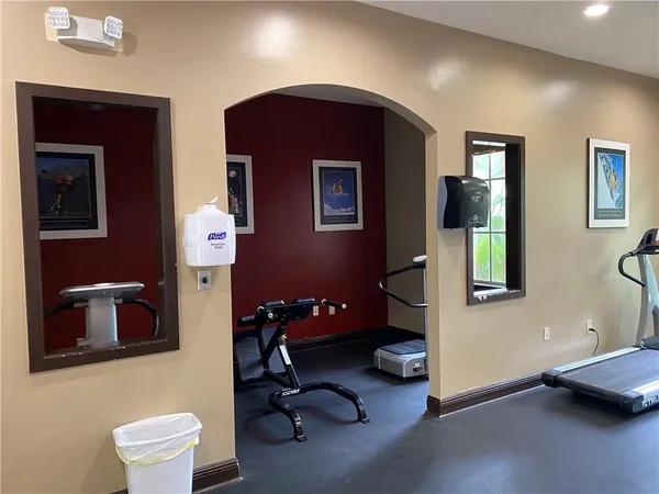 a view of a room with gym equipment