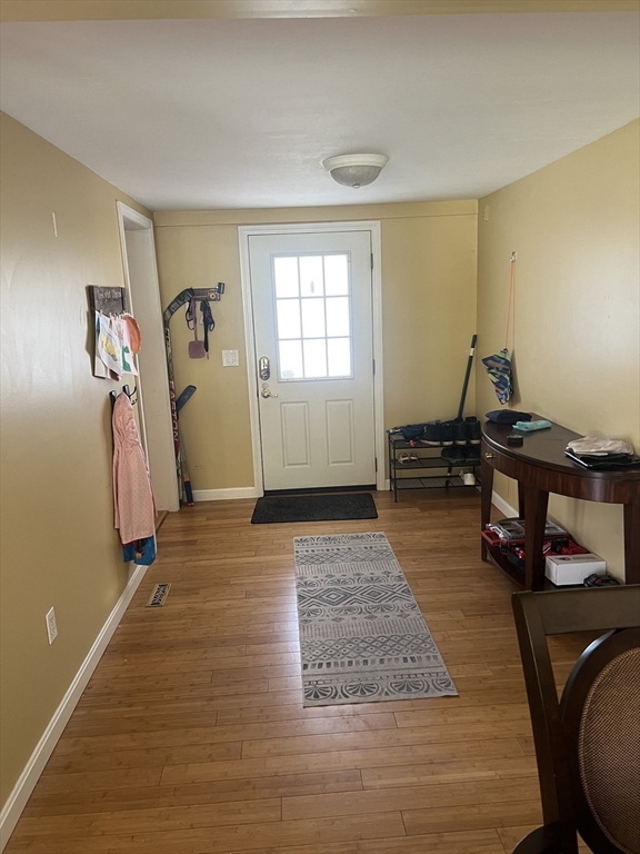 43 Birchland Avenue Springfield, MA 01119 - Photo 2 of 18 a living room with furniture and a wooden floor