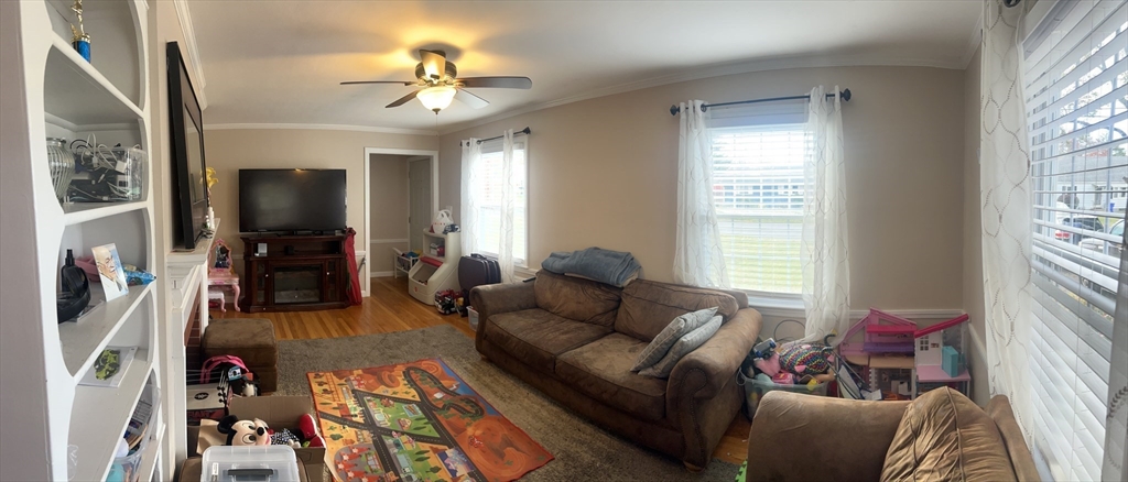 43 Birchland Avenue Springfield, MA 01119 - Photo 5 of 18 a living room with furniture and a flat screen tv