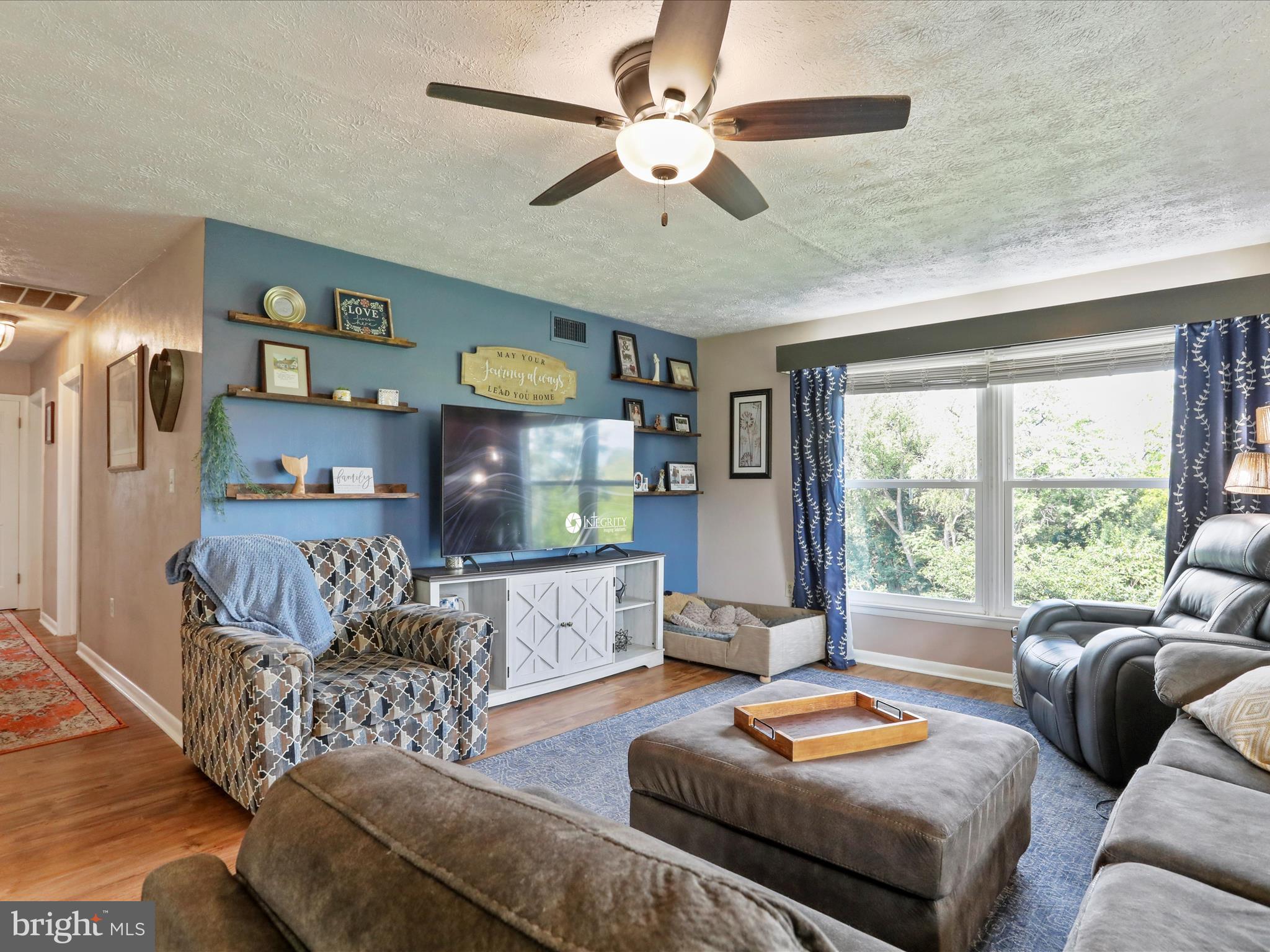 26 Kensington Drive Chambersburg, PA 17201 - Photo 11 of 44 a living room with furniture and a large window