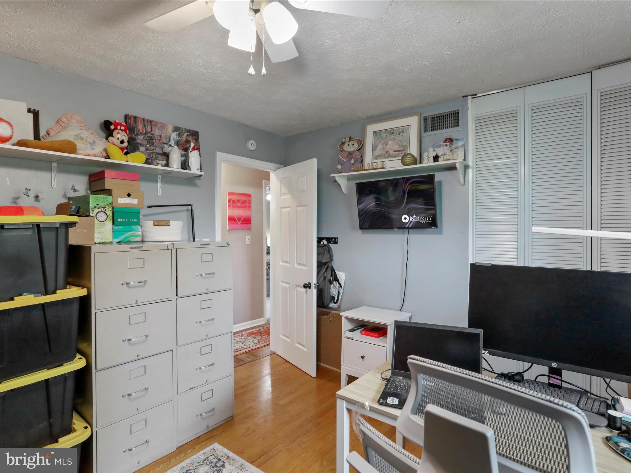 26 Kensington Drive Chambersburg, PA 17201 - Photo 28 of 44 a bedroom with a workspace