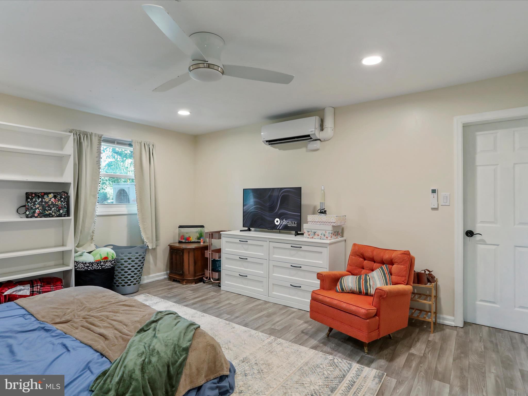 26 Kensington Drive Chambersburg, PA 17201 - Photo 34 of 44 a bedroom with furniture and a flat screen tv