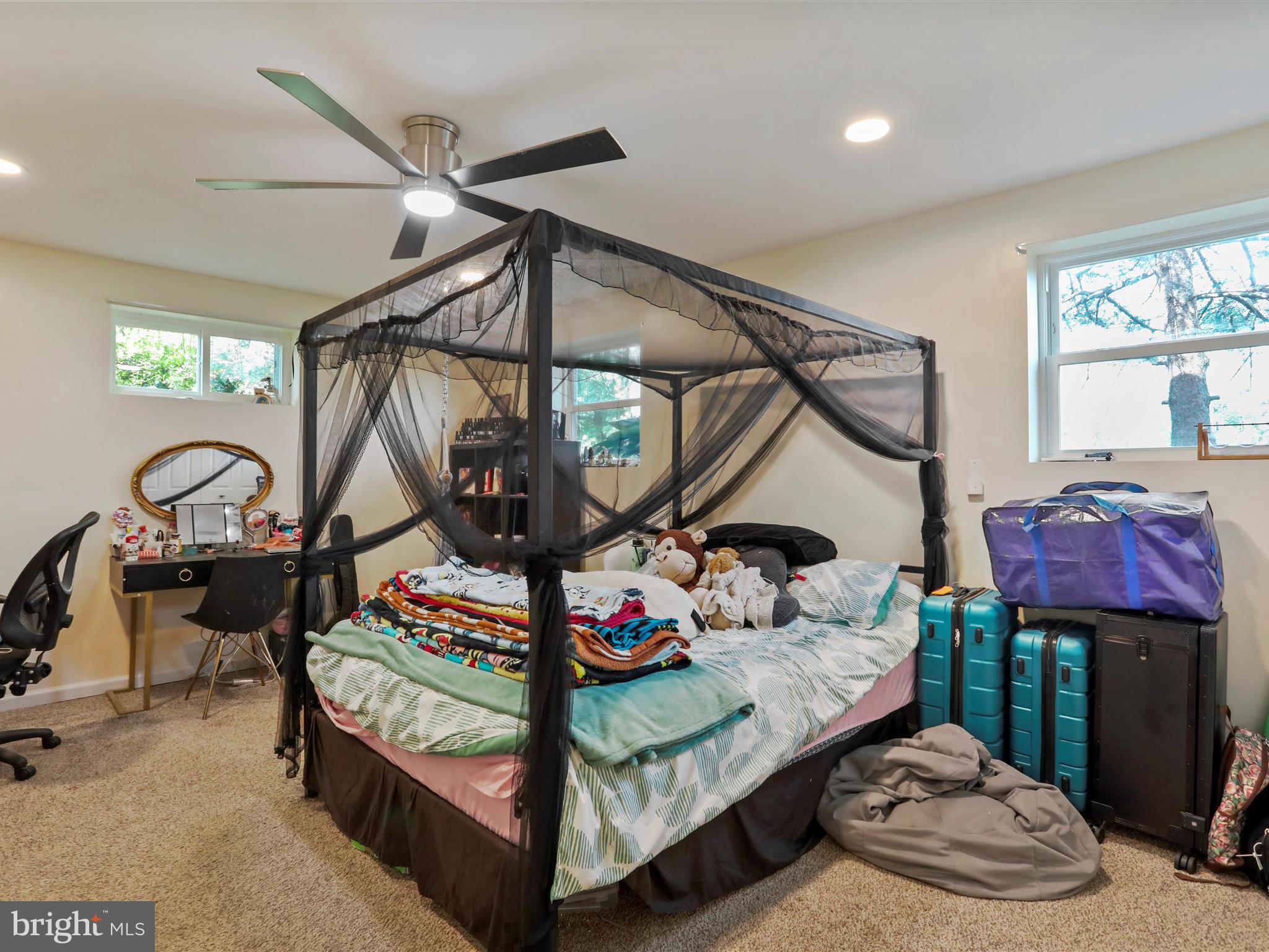 26 Kensington Drive Chambersburg, PA 17201 - Photo 36 of 44 a bedroom with bed and a mirror