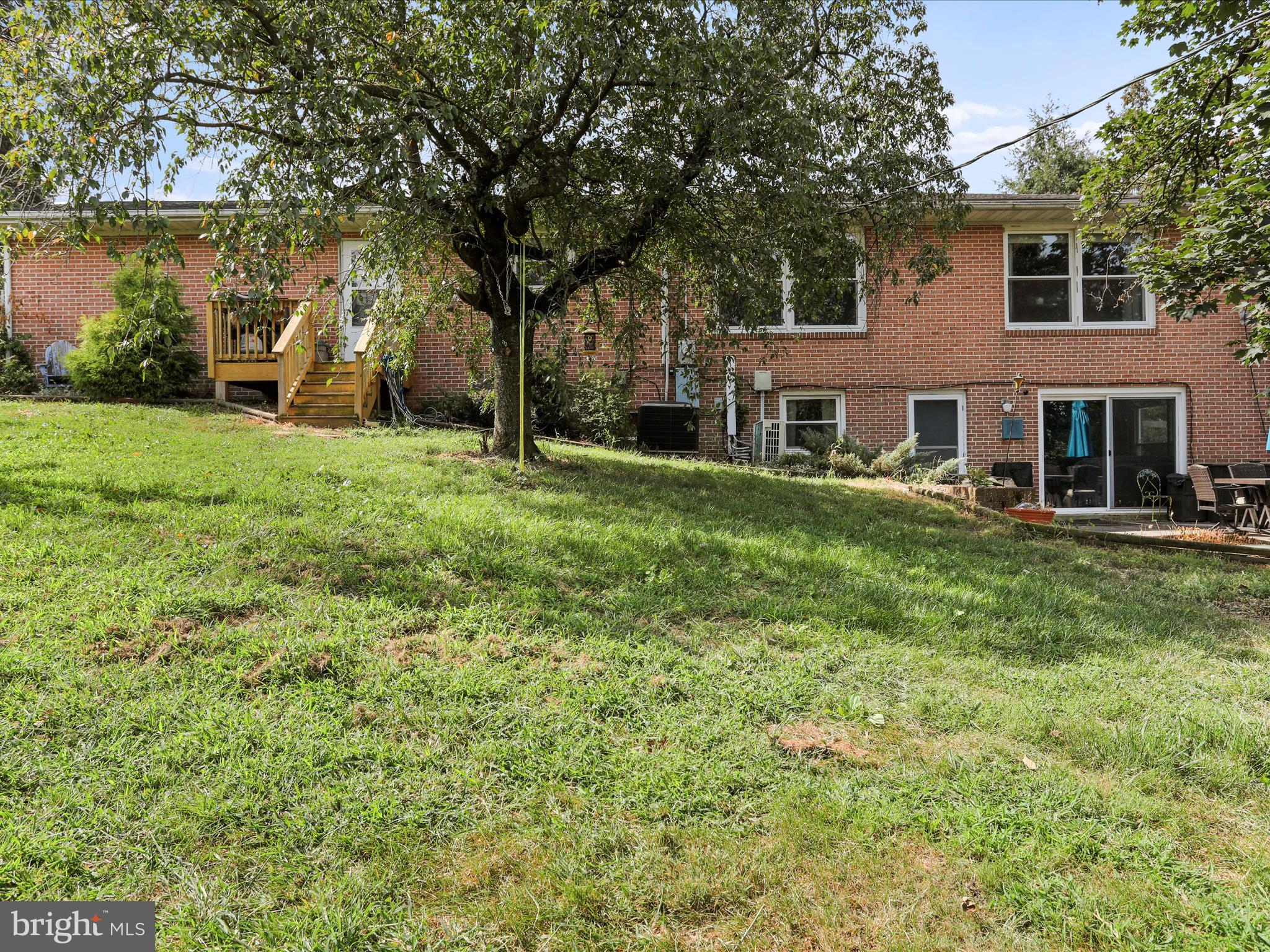 26 Kensington Drive Chambersburg, PA 17201 - Photo 40 of 44 front view of a house with a yard