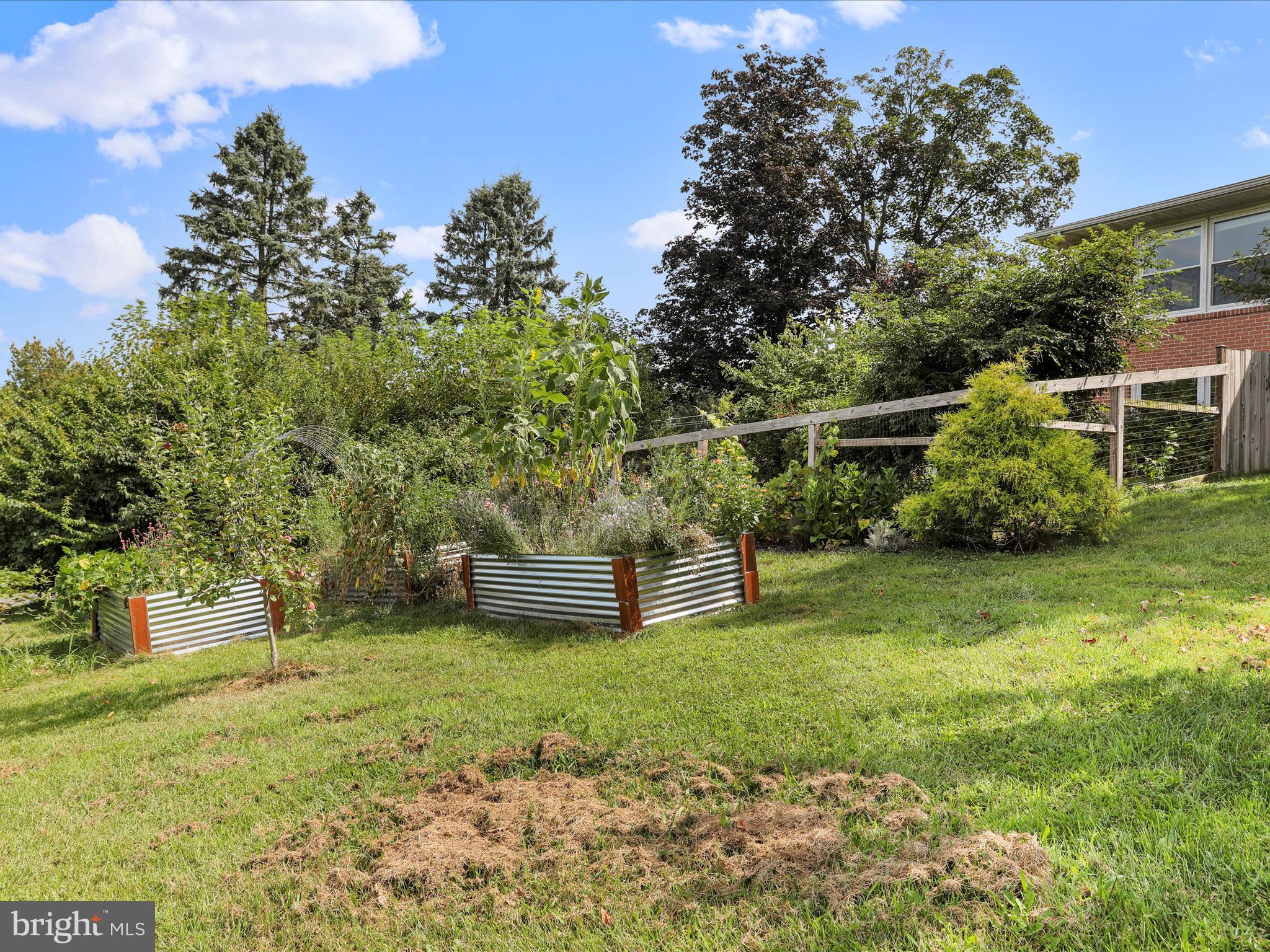 26 Kensington Drive Chambersburg, PA 17201 - Photo 42 of 44 a view of a backyard with swimming pool