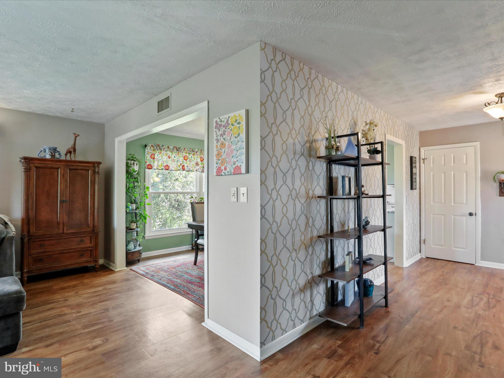 26 Kensington Drive Chambersburg, PA 17201 - Photo 9 of 44 a view of entryway with wooden floor and stairs