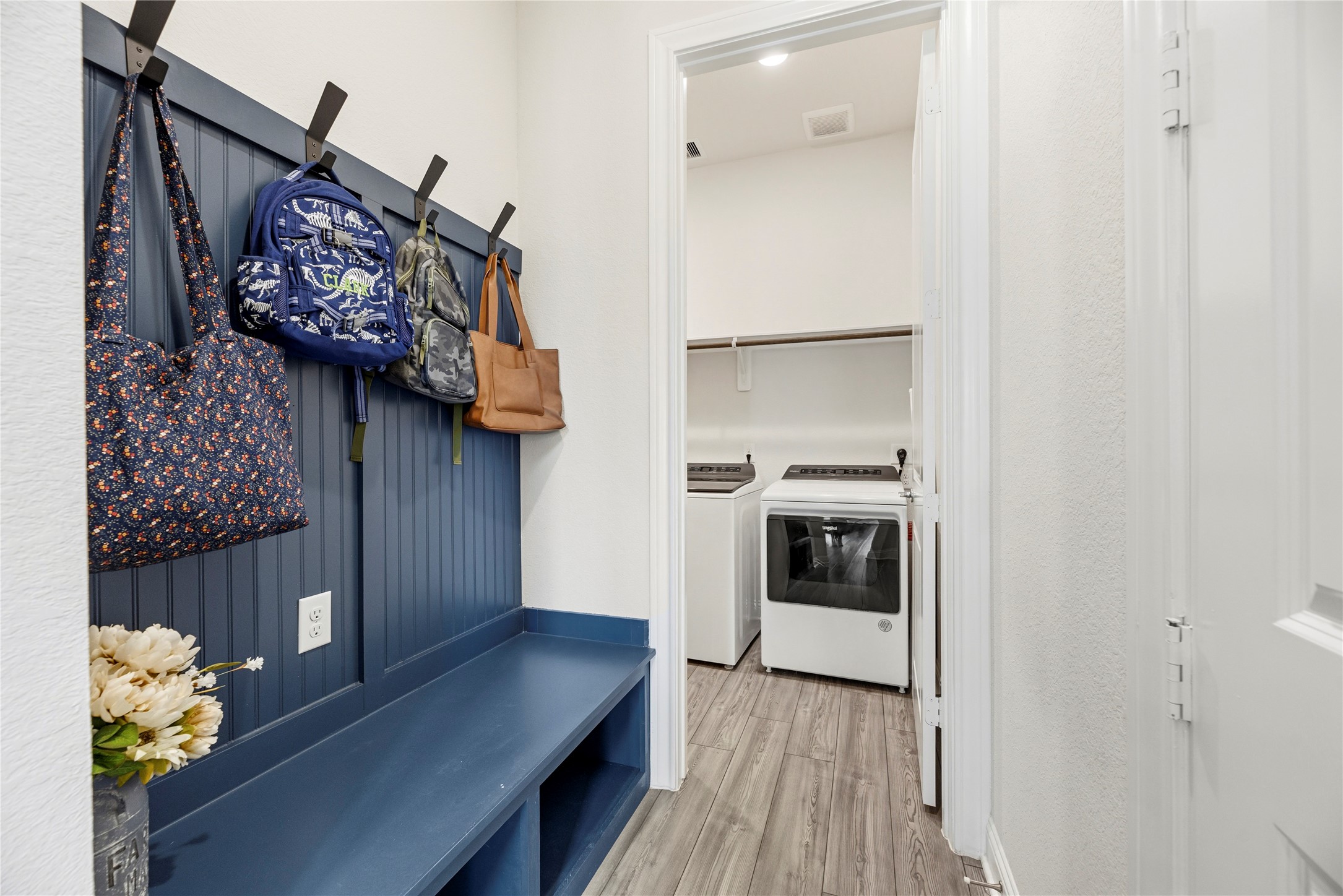10702 Port Harrison Road Cypress, TX 77433 - Photo 23 of 45 The mudroom is tucked away and easy access to the garage and large laundry room.