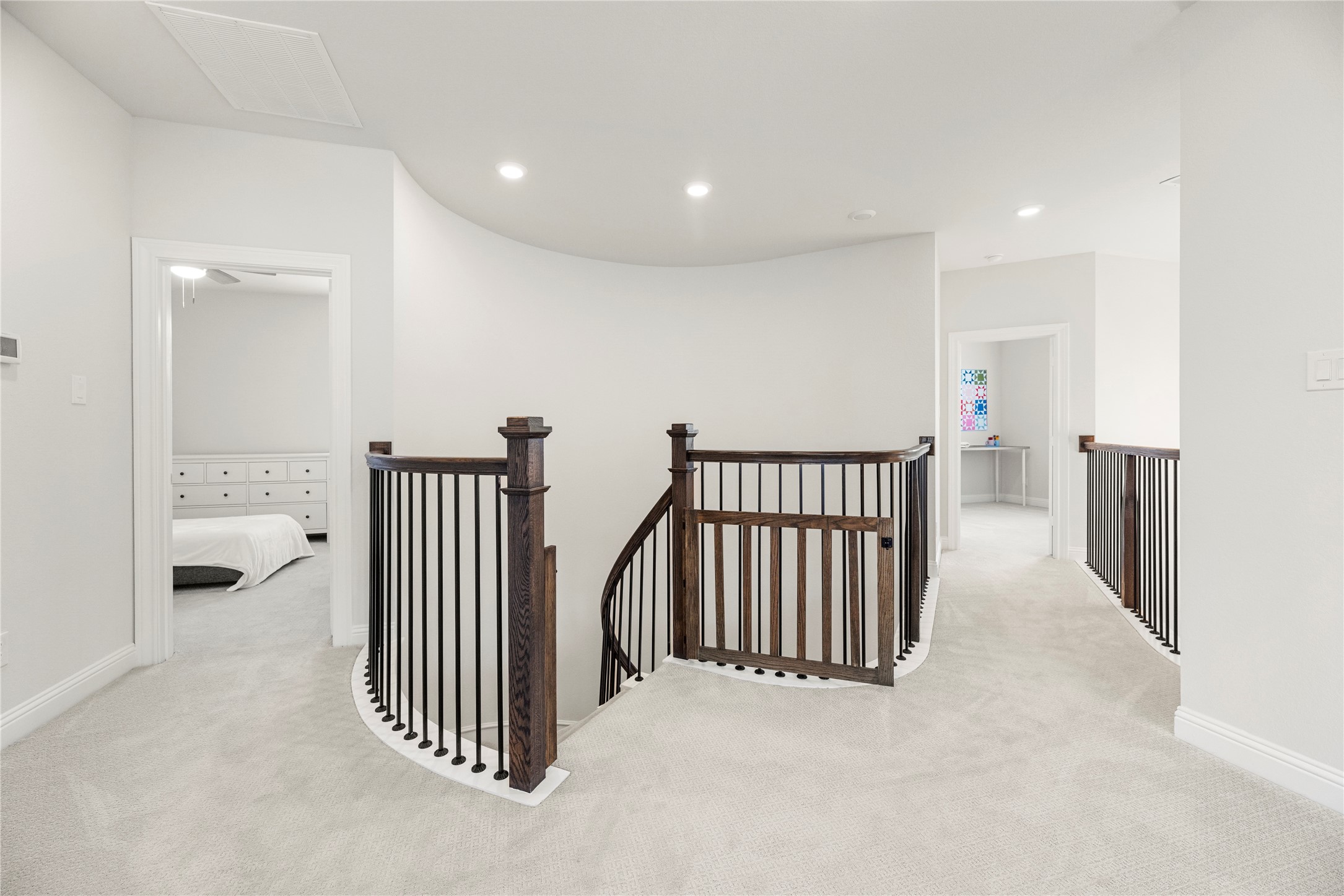 10702 Port Harrison Road Cypress, TX 77433 - Photo 24 of 45 Beautiful spiral staircase leads you to the second floor with 3 bedrooms, 2 baths and a game-room.