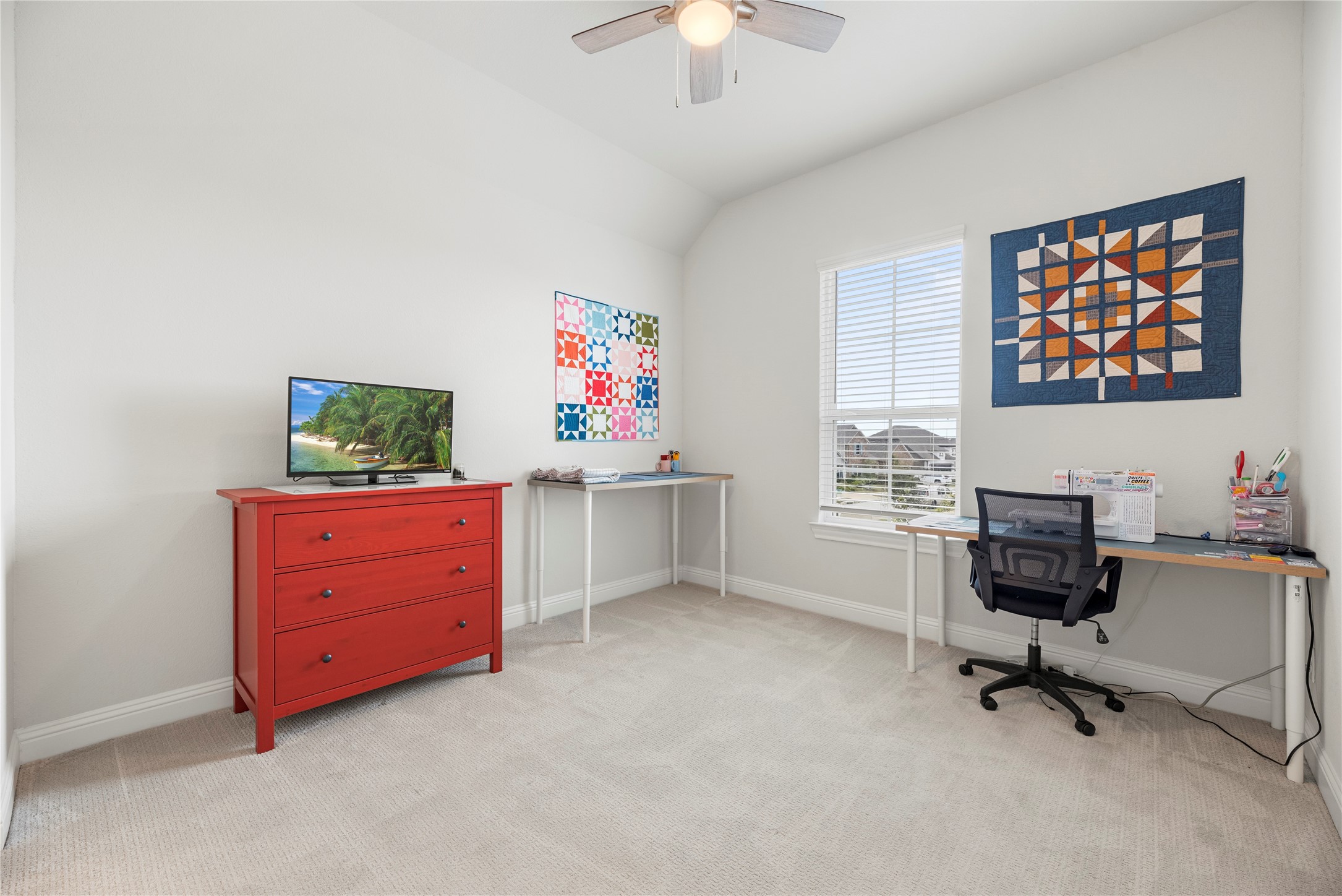 10702 Port Harrison Road Cypress, TX 77433 - Photo 29 of 45 First of 3 bedrooms found upstairs and currently used as a craft room.