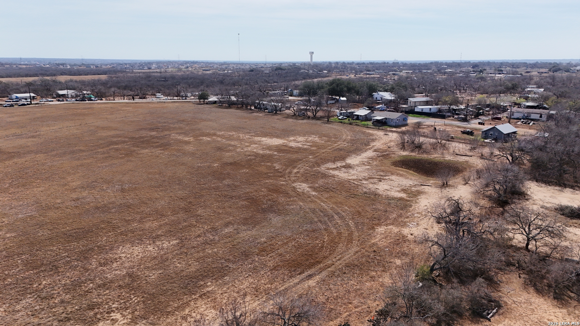 15785 Kilowatt Road Elmendorf, TX 78112 - Photo 9 of 23 an aerial view of multiple house