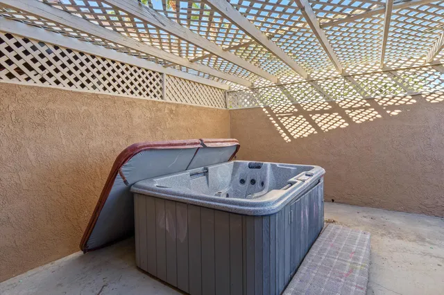 a front view of a house with a yard and a garage