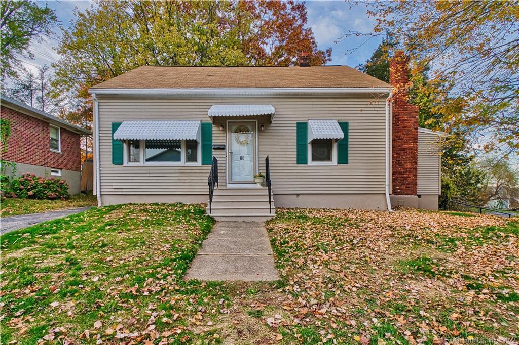 80 Seymour Street Waterbury, CT 06708 - Photo 1 of 1 front view of a house with a yard
