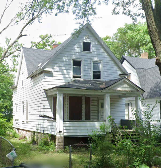 11940 South Yale Avenue Chicago, IL 60628 - Photo 3 of 22 a front view of a house with a yard