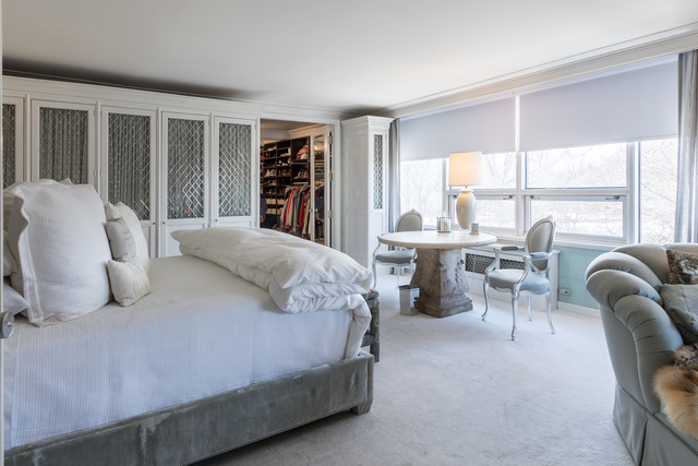 1630 Sheridan Road, Unit 4EF Wilmette, IL 60091 - Photo 15 of 25 a bedroom with a bed a large window and a couch