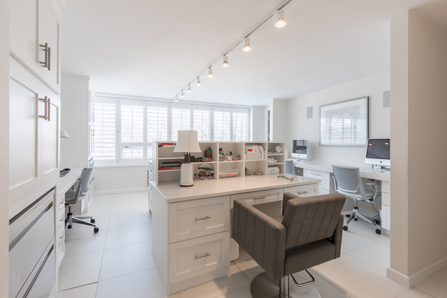 1630 Sheridan Road, Unit 4EF Wilmette, IL 60091 - Photo 16 of 25 a large white kitchen with a sink a window and chairs