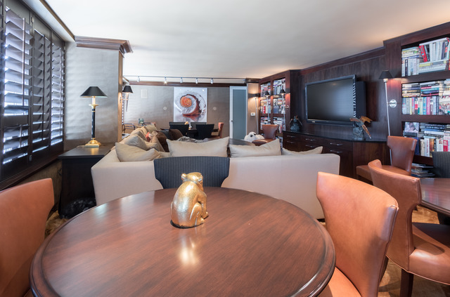 1630 Sheridan Road, Unit 4EF Wilmette, IL 60091 - Photo 20 of 25 a living room with furniture a flat screen tv and a large window