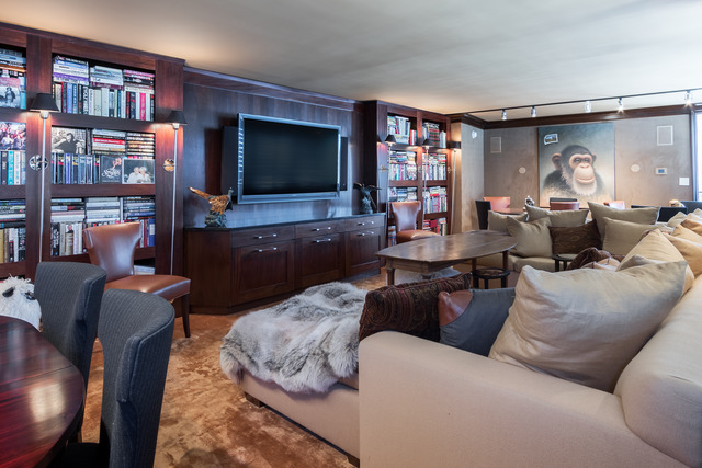 1630 Sheridan Road, Unit 4EF Wilmette, IL 60091 - Photo 23 of 25 a living room with furniture and a flat screen tv