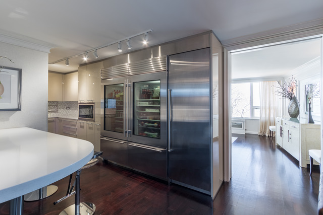 1630 Sheridan Road, Unit 4EF Wilmette, IL 60091 - Photo 8 of 25 a kitchen with a refrigerator and a sink