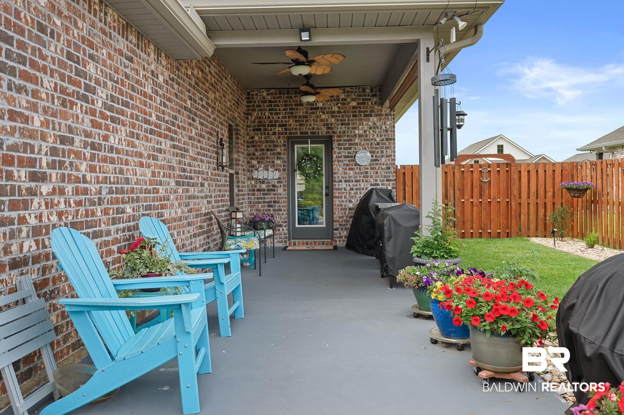1165 Stella Road Foley, AL 36535 - Photo 30 of 42 View of patio with ceiling fan, fence, and area for grilling