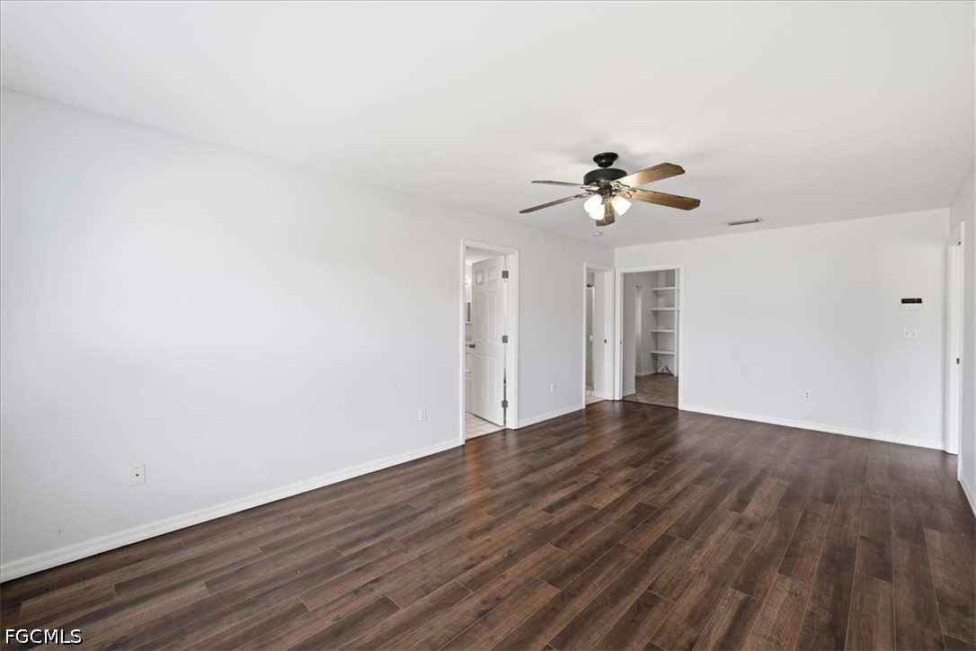 4530 Springview Circle LaBelle, FL 33935 - Photo 21 of 46 wooden floor in an empty room with a window