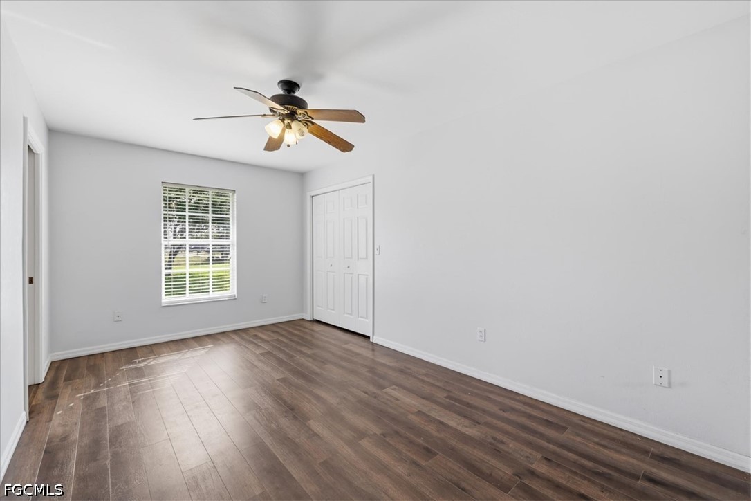 4530 Springview Circle LaBelle, FL 33935 - Photo 24 of 46 wooden floor in an empty room with a window