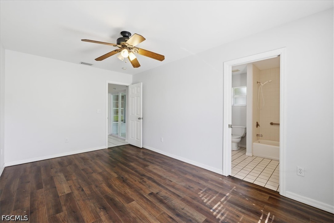 4530 Springview Circle LaBelle, FL 33935 - Photo 25 of 46 a view of empty room with wooden floor