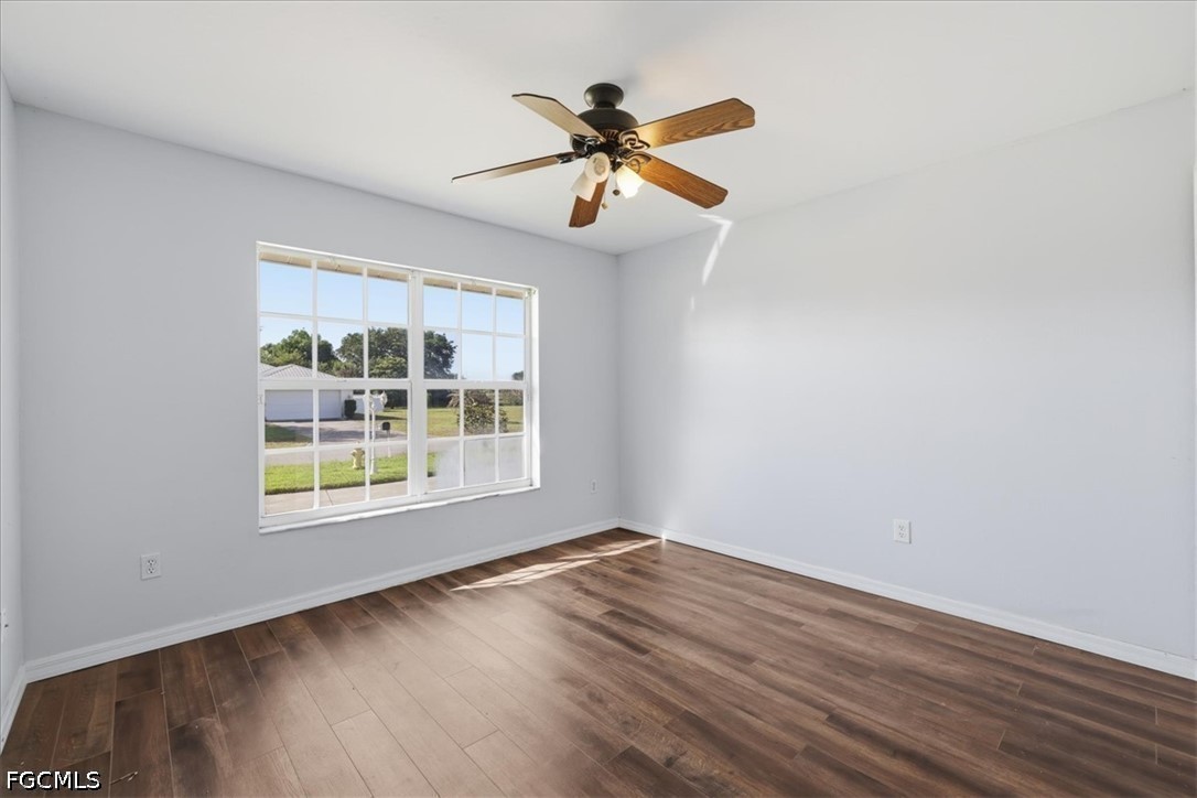 4530 Springview Circle LaBelle, FL 33935 - Photo 27 of 46 wooden floor in an empty room with a window