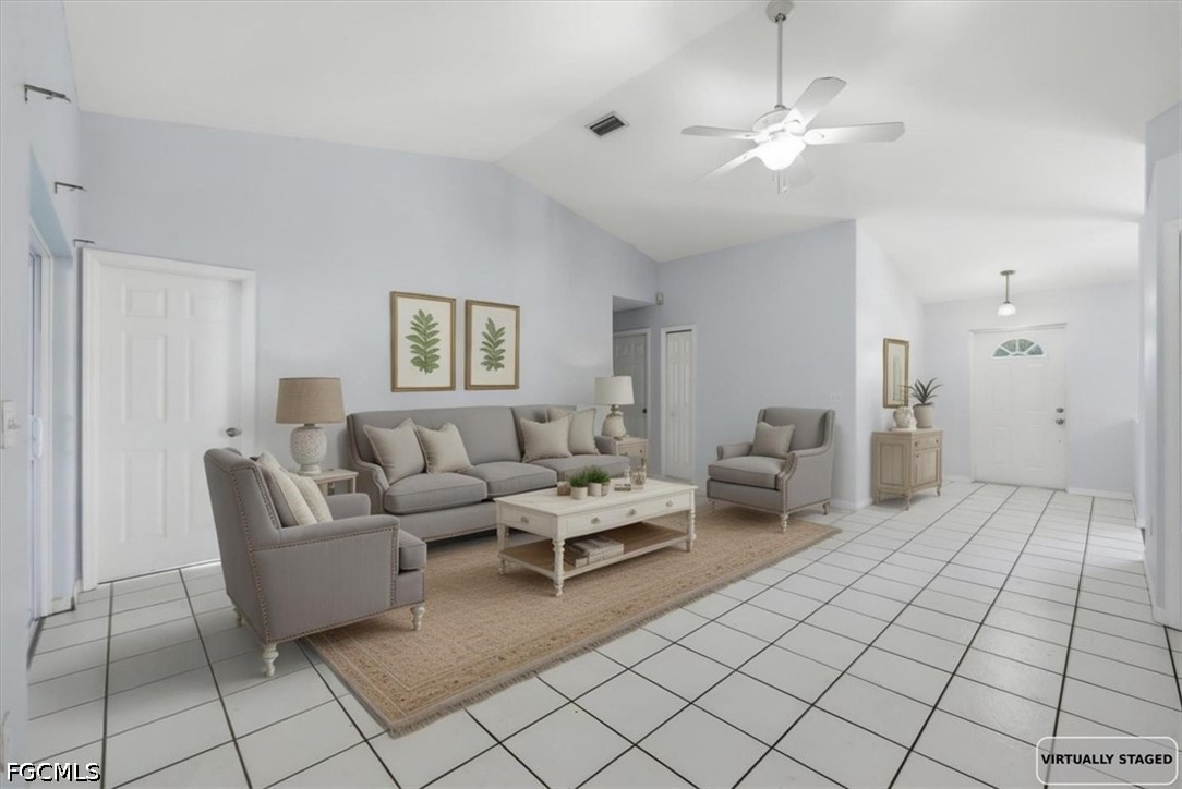 4530 Springview Circle LaBelle, FL 33935 - Photo 3 of 46 a living room with furniture and a chandelier