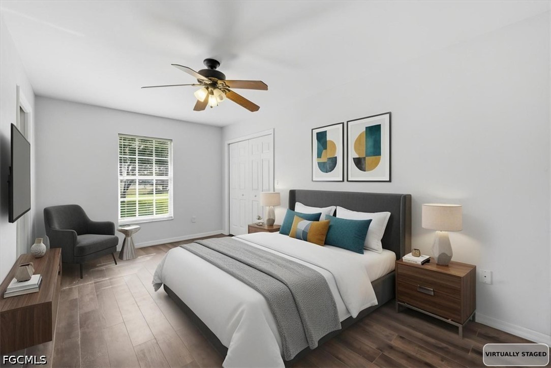 4530 Springview Circle LaBelle, FL 33935 - Photo 5 of 46 a bedroom with bed and wooden floor