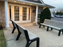 a view of a chairs and tables in the patio