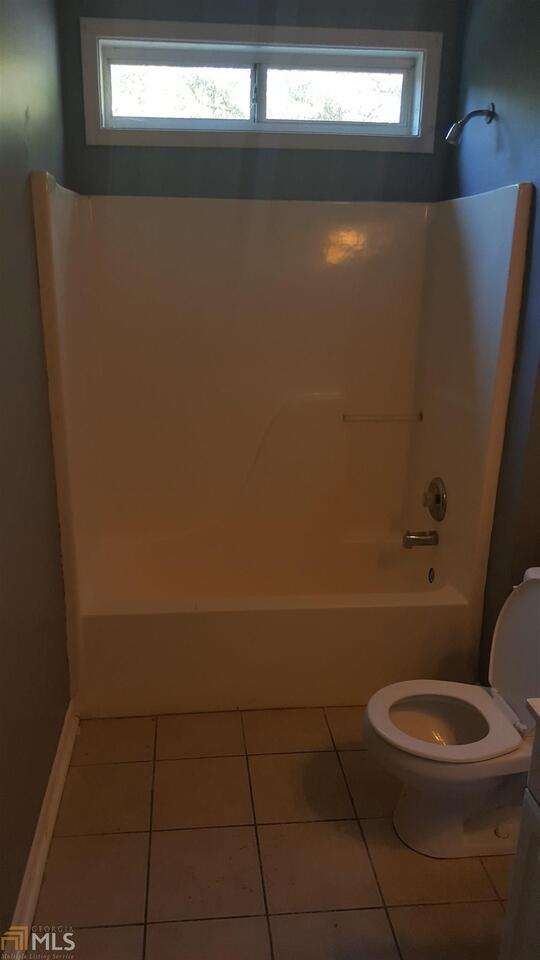 854 Ridge Avenue Northwest, Unit B Atlanta, GA 30318 - Photo 6 of 6 a bathroom with a toilet