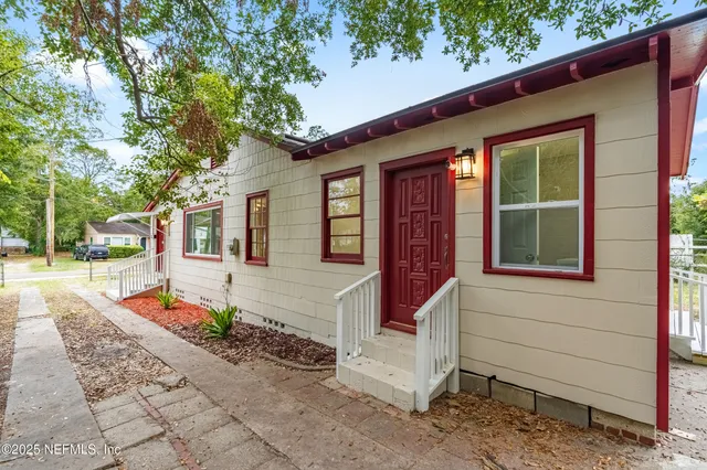 a front view of a house with a porch