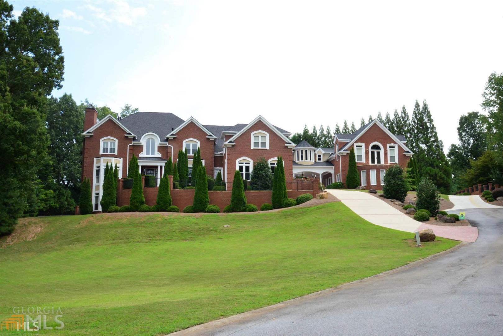 8131 Nesbit Ferry Road, Unit 67 Sandy Springs, GA 30350 - Photo 1 of 1 a view of house with yard and entertaining space