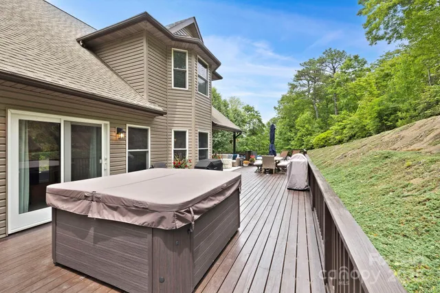a view of outdoor kitchen and seating area