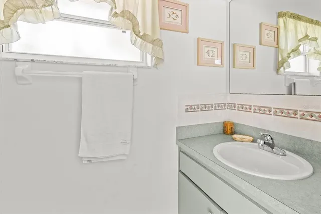 an aerial view of a house with yard