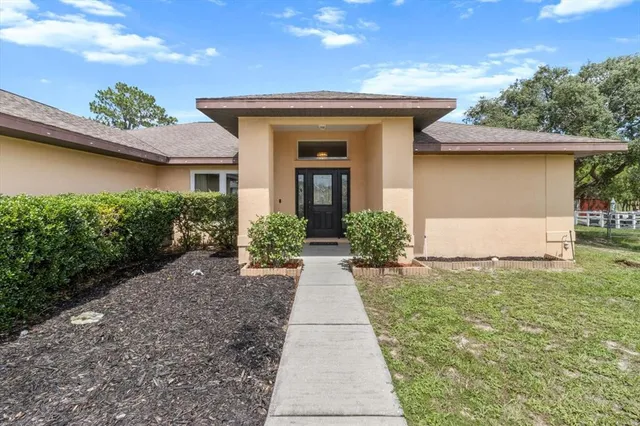 a view of a utility room with windows