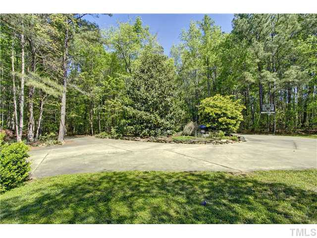 3729 Bosco Road New Hill, NC 27562 - Photo 23 of 25 View of the circular drive!! Let's play some basketball!!! View