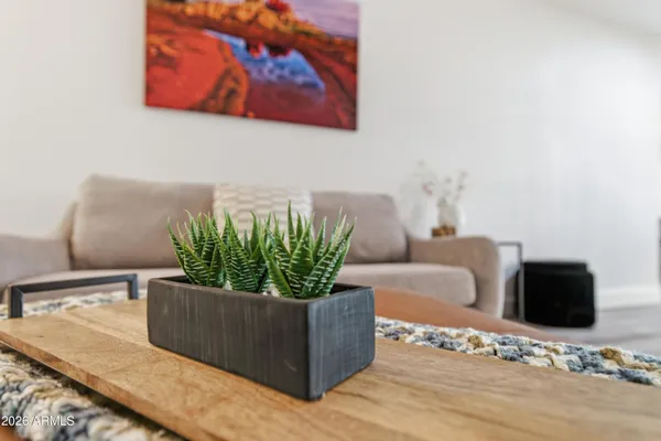a bathroom with a double vanity sink and mirror