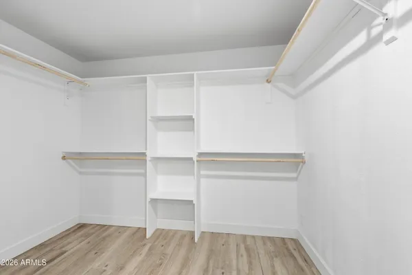 an aerial view of a house with a garden and pool