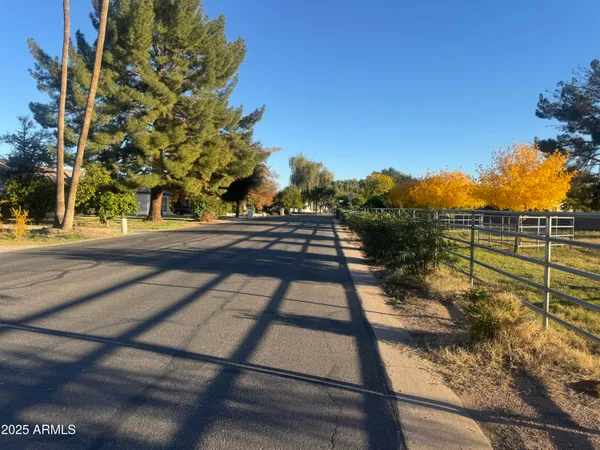 an aerial view of a houses with a swimming pool