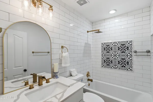 an aerial view of a house with outdoor space