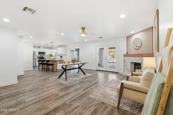 a bathroom with a double vanity sink and mirror