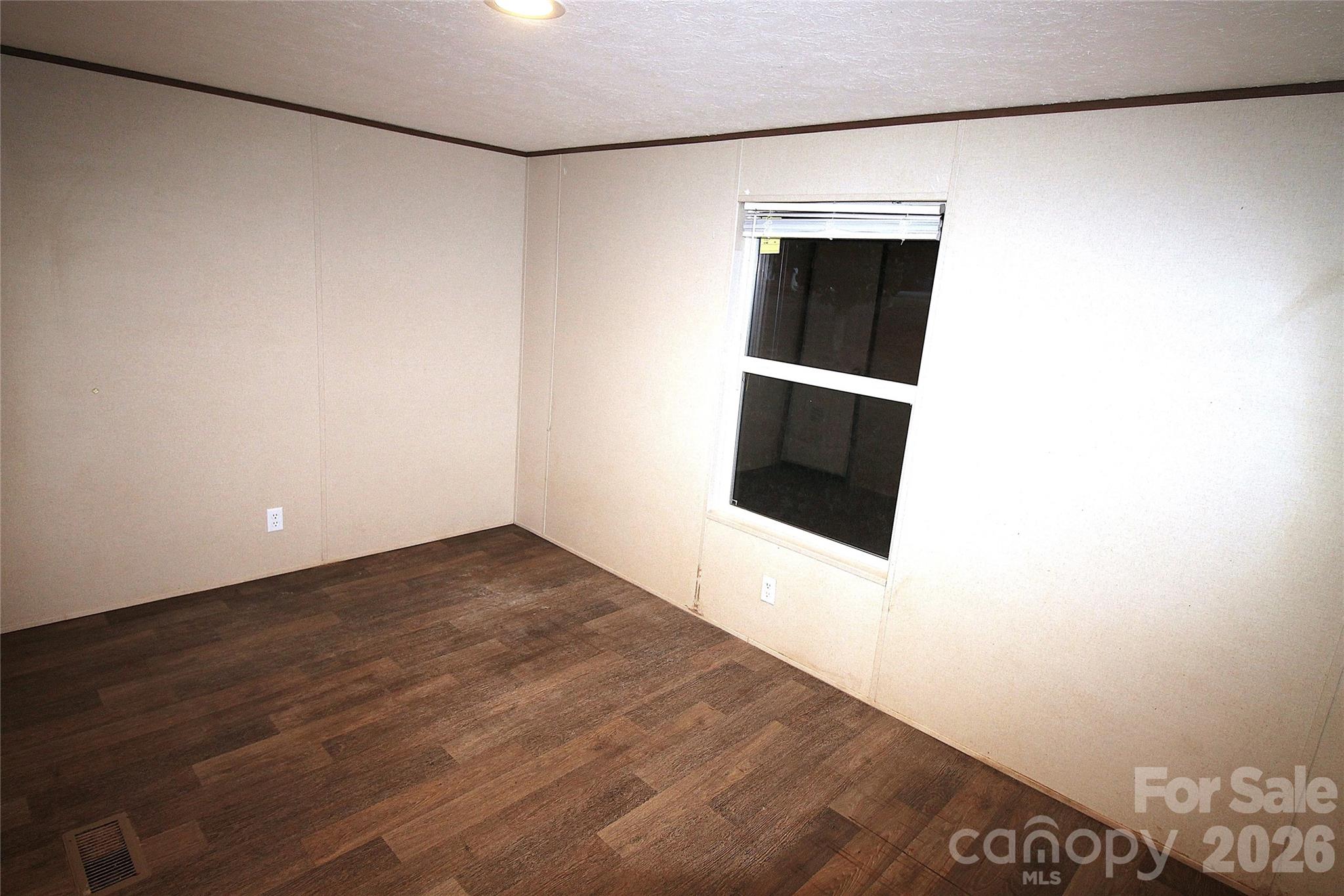 203 Ratchford Farm Road Gastonia, NC 28056 - Photo 19 of 25 a view of an empty room with a kitchen