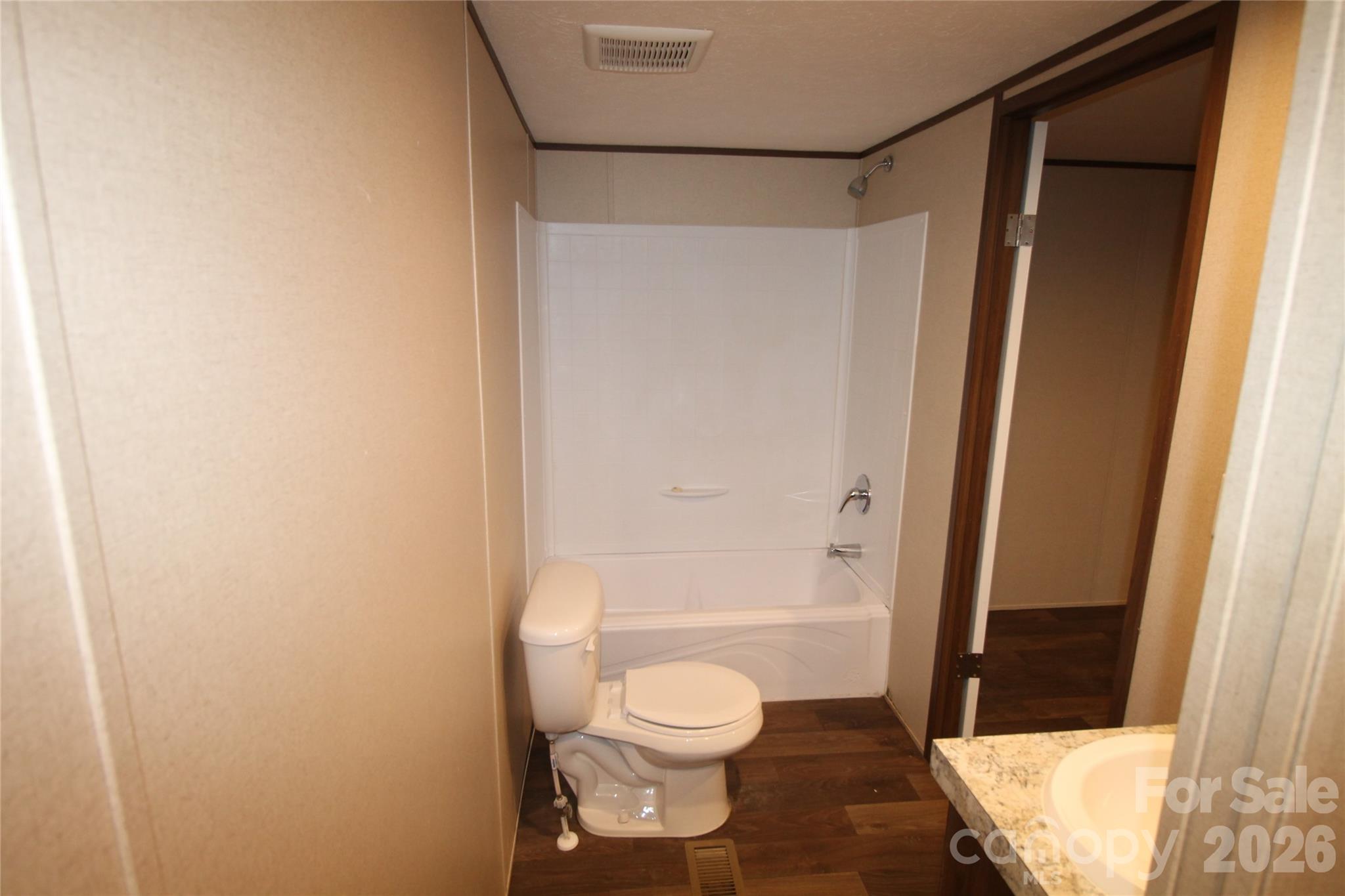 203 Ratchford Farm Road Gastonia, NC 28056 - Photo 21 of 25 a bathroom with a toilet and a shower