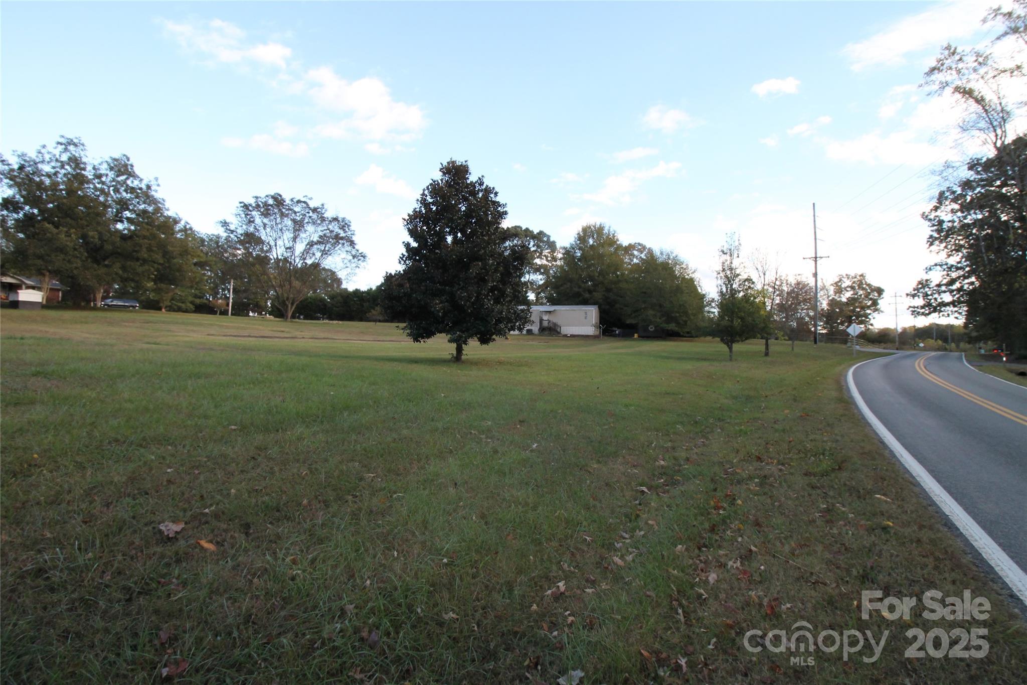 203 Ratchford Farm Road Gastonia, NC 28056 - Photo 3 of 16 a view of a field with of trees