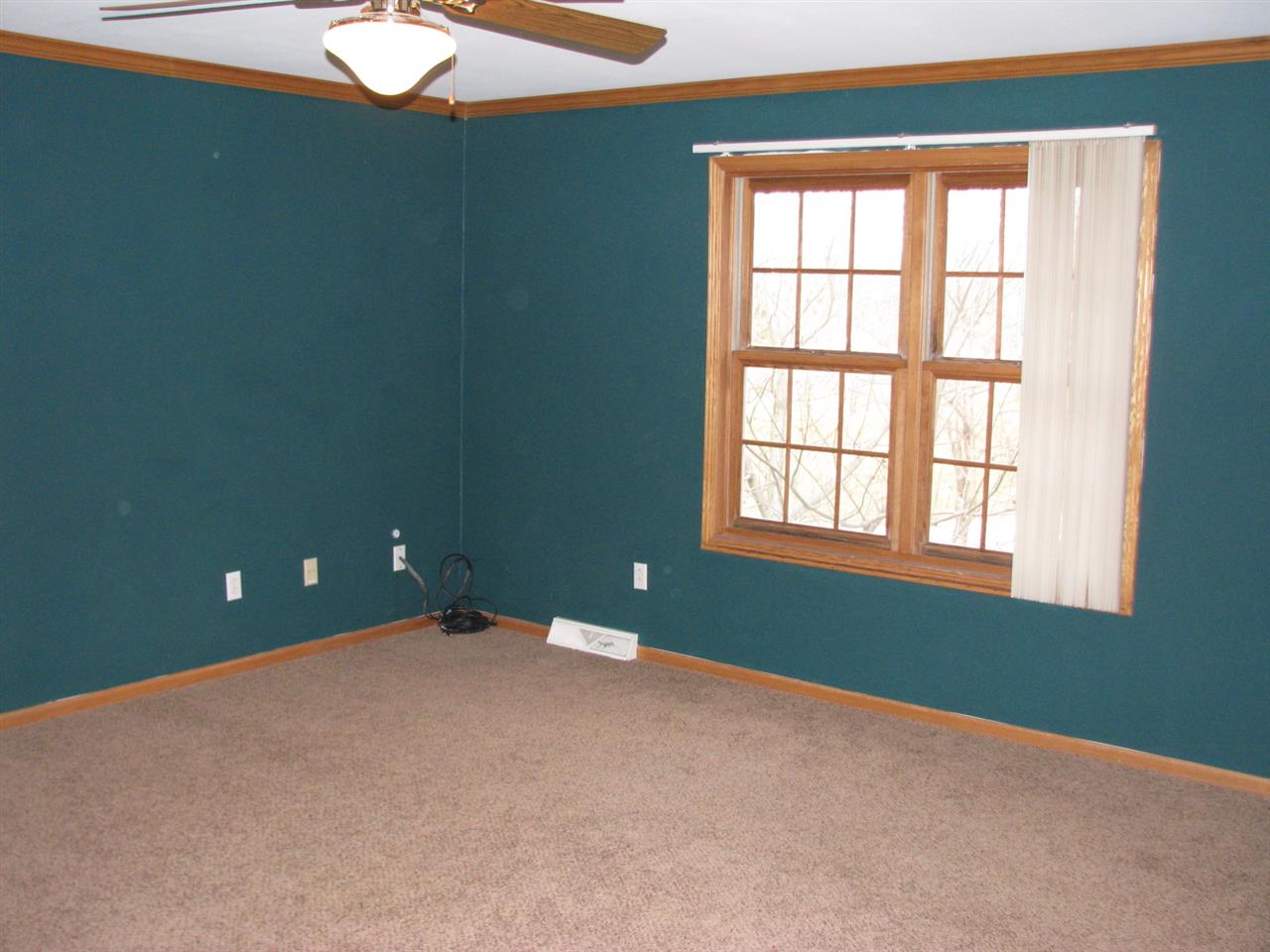 1123 South Weldon Road Rockford, IL 61102 - Photo 15 of 19 a view of an empty room with a window