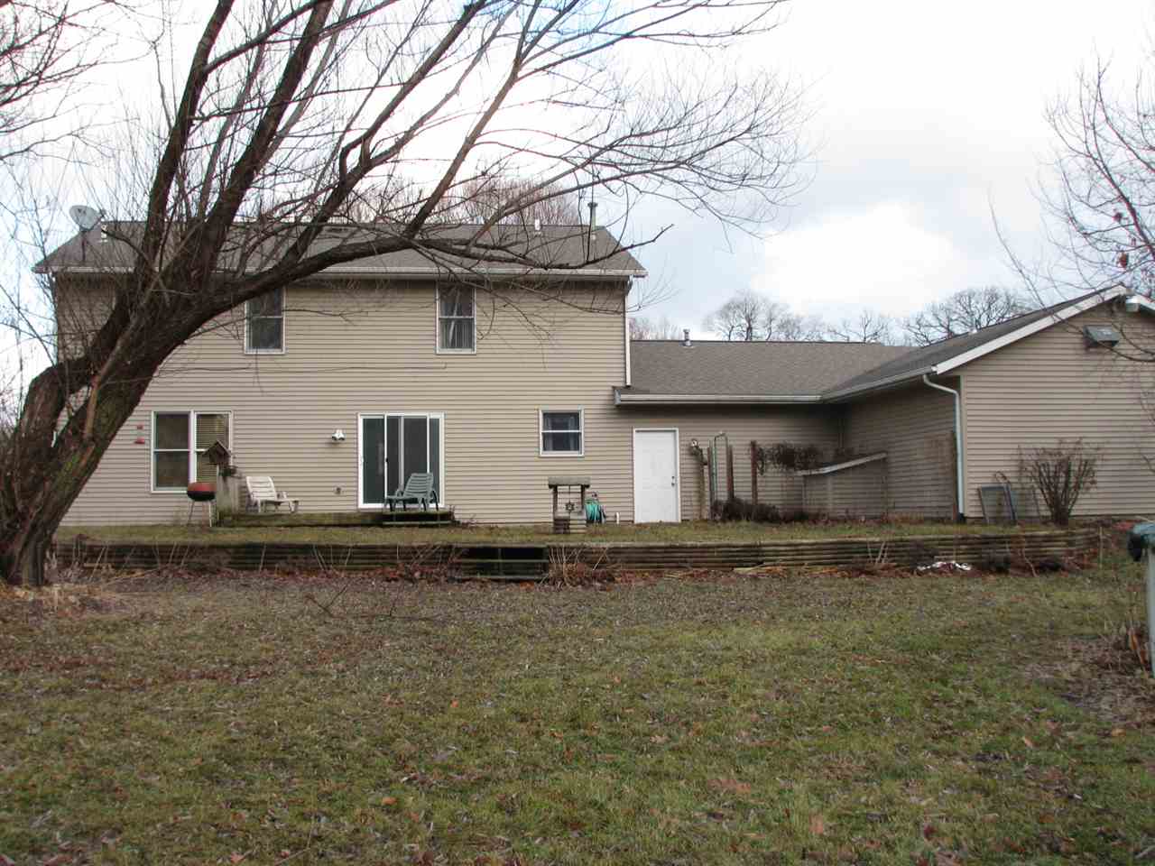 1123 South Weldon Road Rockford, IL 61102 - Photo 19 of 19 a view of a white house with a yard