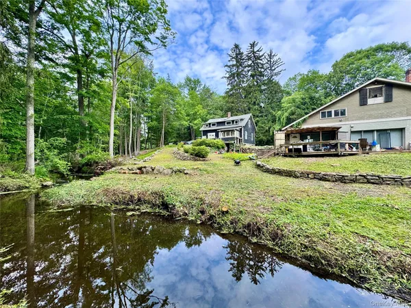 a view of backyard with green space