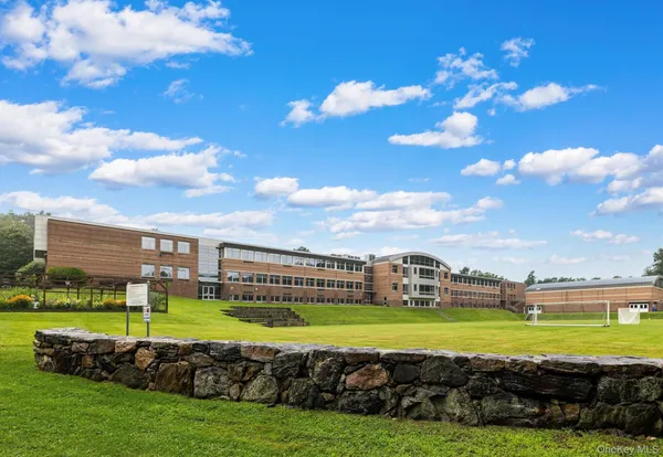 a sign that is on the wall of building